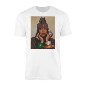 White crewneck t-shirt flat lay featuring a rectangular portrait of a woman in a bohemian hat and chunky bracelets