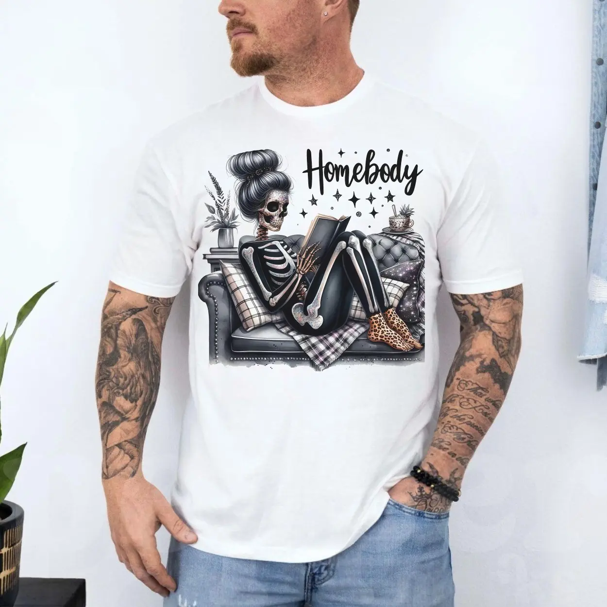 Skeleton Homebody Cozy Reading Graphic T-Shirt 4 Skeleton Homebody Cozy Reading Graphic T Shirt 4 1.jpg