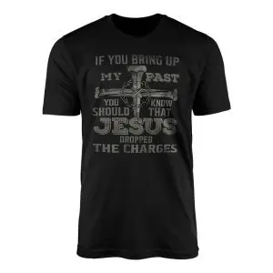 Black flat-lay t-shirt featuring a cross of three iron nails with a thorny crown and Jesus Dropped The Charges text.