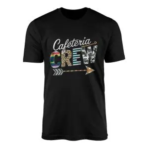 Cafeteria Crew graphic with rainbow stripe, leopard print, and camo letters above a tribal arrow on a black flat lay tee