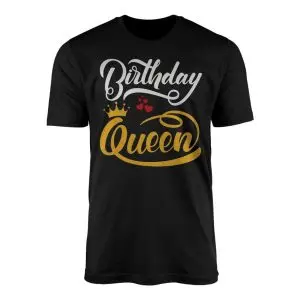 Black crewneck t-shirt printed with white script Birthday and gold Queen lettering accented by a crown and red hearts.