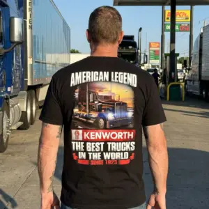 American Legend Kenworth Truck Fan T-Shirt 10 Lifestyle shot of the back of a black item of clothing, highlighting the "AMERICAN LEGEND" Kenworth truck artwork.