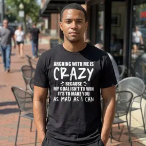 Arguing With Me Is Crazy Sarcastic T-Shirt 10 Lifestyle view of the sarcastic text t-shirt worn in a casual everyday setting.