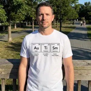 Autism Periodic Table Elements T-Shirt 11 Casual lifestyle setting highlighting the autism periodic table apparel.