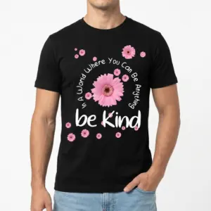 Be Kind Floral Positivity T-Shirt 8 Close-up of the "Be Kind floral shirt" design on a black t-shirt, highlighting the central pink daisy and white lettering.