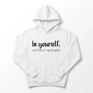 Be Yourself Minimalist Inspirational T-Shirt 7 Close-up of the upper left side of the white t-shirt, showing the start of the 'be yourself' phrase and shoulder.