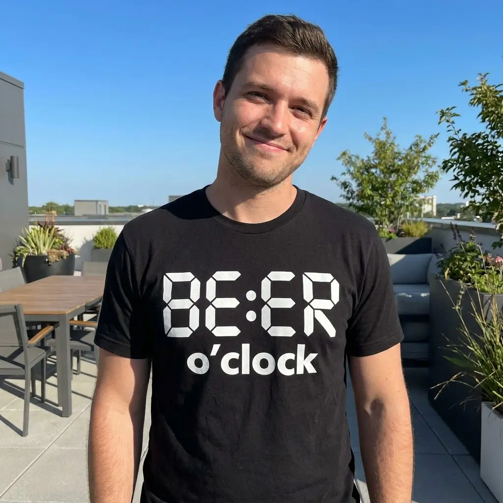 Casual lifestyle shot highlighting the beer o'clock shirt with its white digital clock design in a social setting.