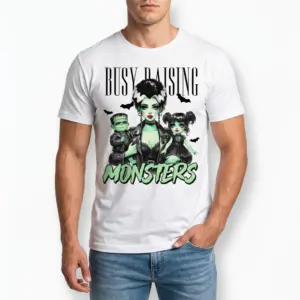 Busy Raising Monsters Halloween Mom T-Shirt 8 White t-shirt displaying the "Busy Raising Monsters" graphic, featuring a spooky green-skinned mother, son, and daughter.