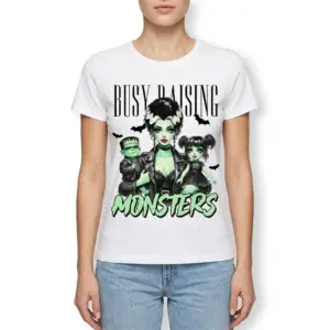 Busy Raising Monsters Halloween Mom T-Shirt 9 Stylish white t-shirt with a unique Halloween design: a monster mom and two kids with "Busy Raising Monsters" text.