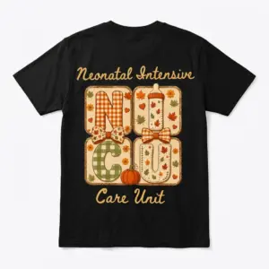 Black t-shirt, back flatlay, displaying "Neonatal Intensive Care Unit" with autumn-themed NICU letters, bows, and a pumpkin.