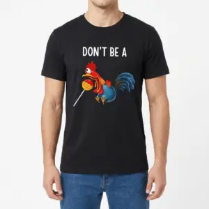 Don't Be A Sucker Rooster Pun T-Shirt 9 Front view of a man wearing the black funny rooster pun t-shirt with a lollipop graphic.
