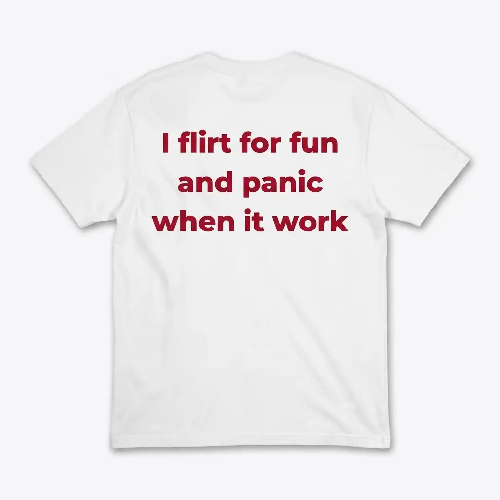 Back flat lay of a white t-shirt featuring dark red text that reads I flirt for fun and panic when it work.