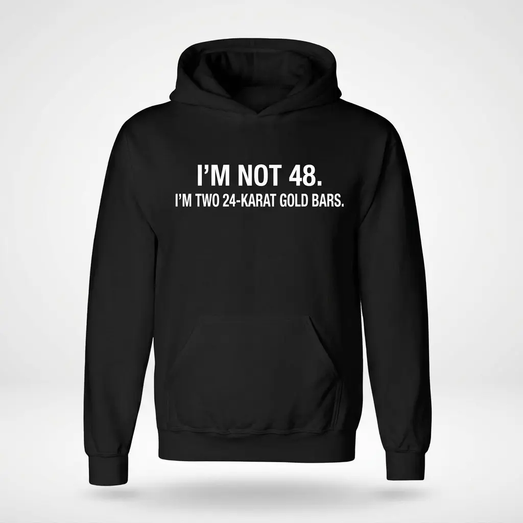 Flat lay front view of a hoodie featuring the funny 48th birthday text design about 24-karat gold bars.