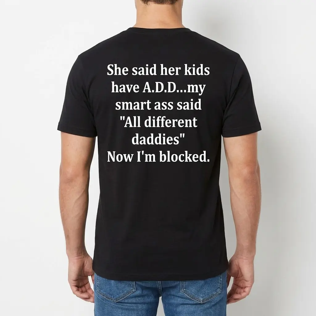 Back view of a man wearing a black t-shirt printed with the funny A.D.D. sarcastic joke text.
