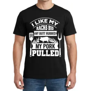Funny BBQ Smoker 'I Like My Racks Big' T-Shirt 9 Front view of a man wearing a black t-shirt with the humorous BBQ design: "I LIKE MY RACKS BIG MY BUTT RUBBED MY PORK PULLED" and pig graphic.