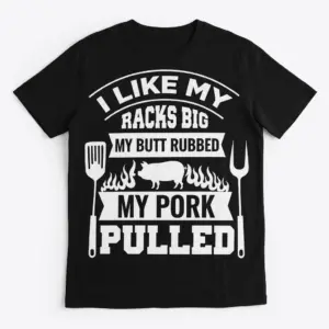 Funny BBQ Smoker 'I Like My Racks Big' Tank Top 7 Black t-shirt with a humorous white graphic: "I LIKE MY RACKS BIG MY BUTT RUBBED MY PORK PULLED", flanked by a spatula and a carving fork.