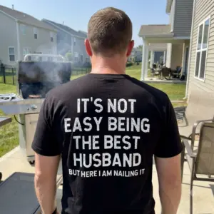 Funny Best Husband Ever T-Shirt 10 Lifestyle view showcasing the funny best husband ever design printed on the back of the apparel.