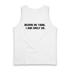 Funny Born in 1986 I Am Only 26 Birthday T-Shirt 8 Back flat lay view of a tank top featuring the humorous text BORN IN 1986. I AM ONLY 26.