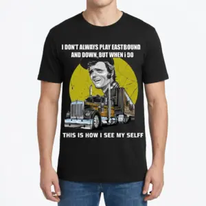 Funny Burt Reynolds Trucker Quote Graphic Tee 9 A man wearing the black graphic t-shirt featuring a vintage-style trucking design and humorous quote, viewed from the front.