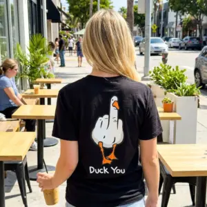 Funny Duck You Middle Finger Meme T-Shirt 11 Casual lifestyle scene displaying the funny Duck You meme design on apparel.