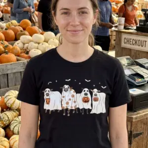Funny Halloween Cow Ghost T-Shirt 11 Person wearing t-shirt with cow ghost design in a casual setting.