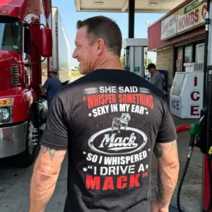 Funny "I Drive A Mack" Trucker T-Shirt 10 Black t-shirt showcasing the "I Drive A Mack" joke design, perfect for truckers and diesel enthusiasts.
