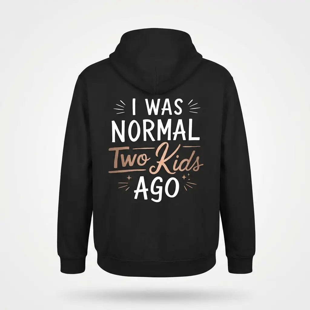Back flat lay of a hoodie with the 'I Was Normal Two Kids Ago' parenting quote design.