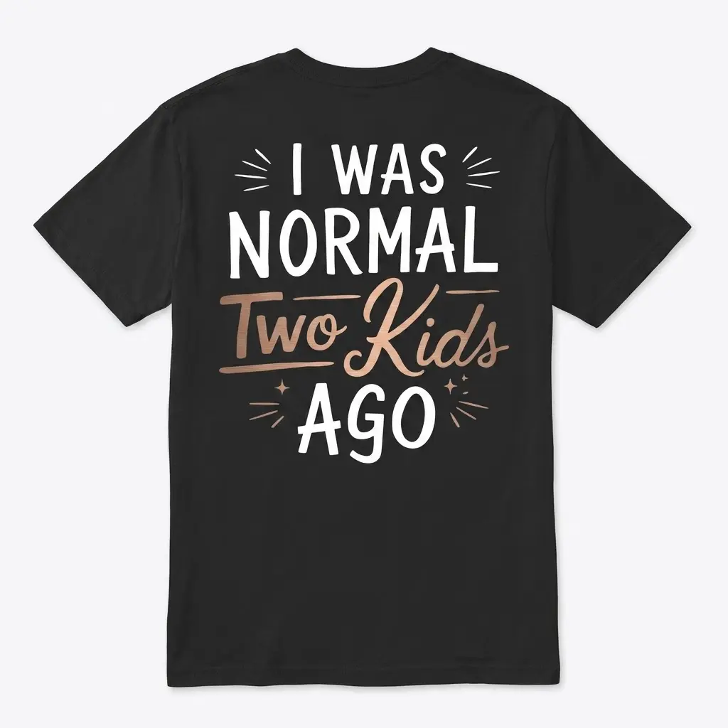 Back flat lay of a black t-shirt featuring text that reads 'I Was Normal Two Kids Ago'.