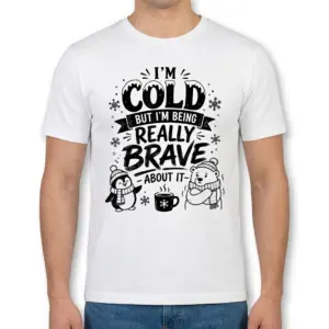 Funny 'I'm Cold But Brave' Winter T-Shirt 8 Man wearing the white 'I'm Cold But I'm Being Really Brave About It' t-shirt, featuring a penguin, polar bear, and snowflakes.
