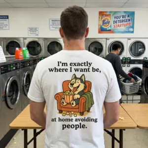 Funny Introvert Dog Homebody T-Shirt 11 Lifestyle image of a model wearing the funny introvert dog t-shirt with homebody design.