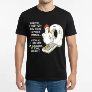 Funny Medical Scans Chicken Humor T-Shirt 9 Male model wearing a t-shirt with a cartoon chicken and CT scanner, displaying a humor quote.