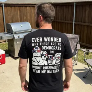 Funny Mount Rushmore Political Graphic T-Shirt 10 Lifestyle view showcasing the funny Mount Rushmore political graphic printed on the back of a black garment.
