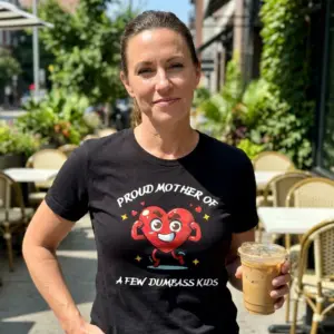 Funny Proud Mother of Dumbass Kids T-Shirt 11 Casual lifestyle view featuring the funny proud mother design printed across the garment front.