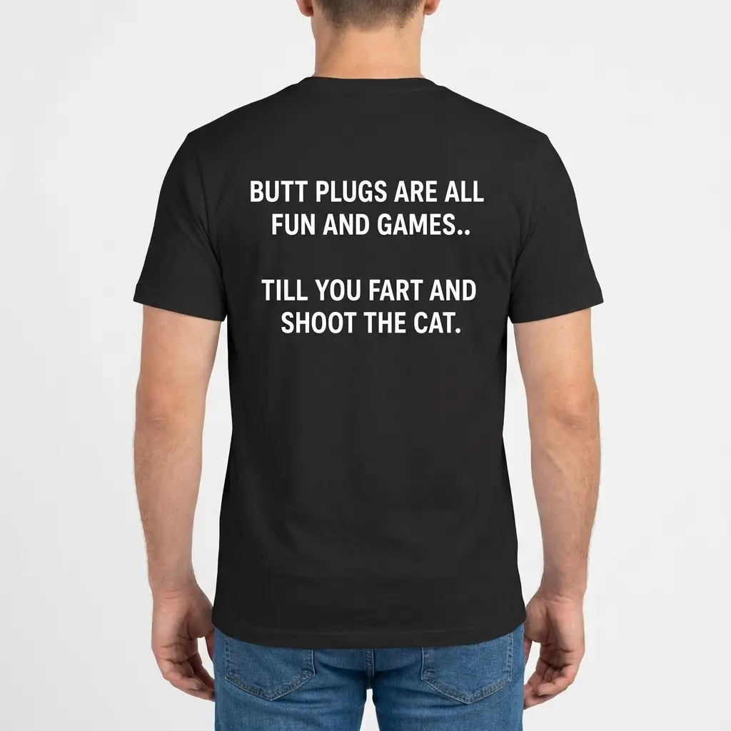 Rear view of a man wearing the black funny adult humor shirt featuring the gag text about butt plugs and shooting the cat.