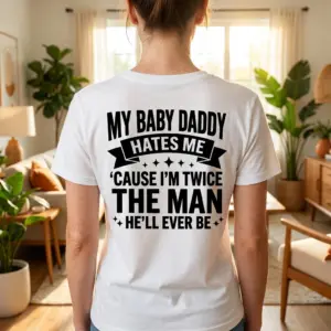 Funny Single Mom Baby Daddy Graphic T-Shirt 10 A casual lifestyle shot highlighting the funny single mom shirt design printed on the back of a white garment.