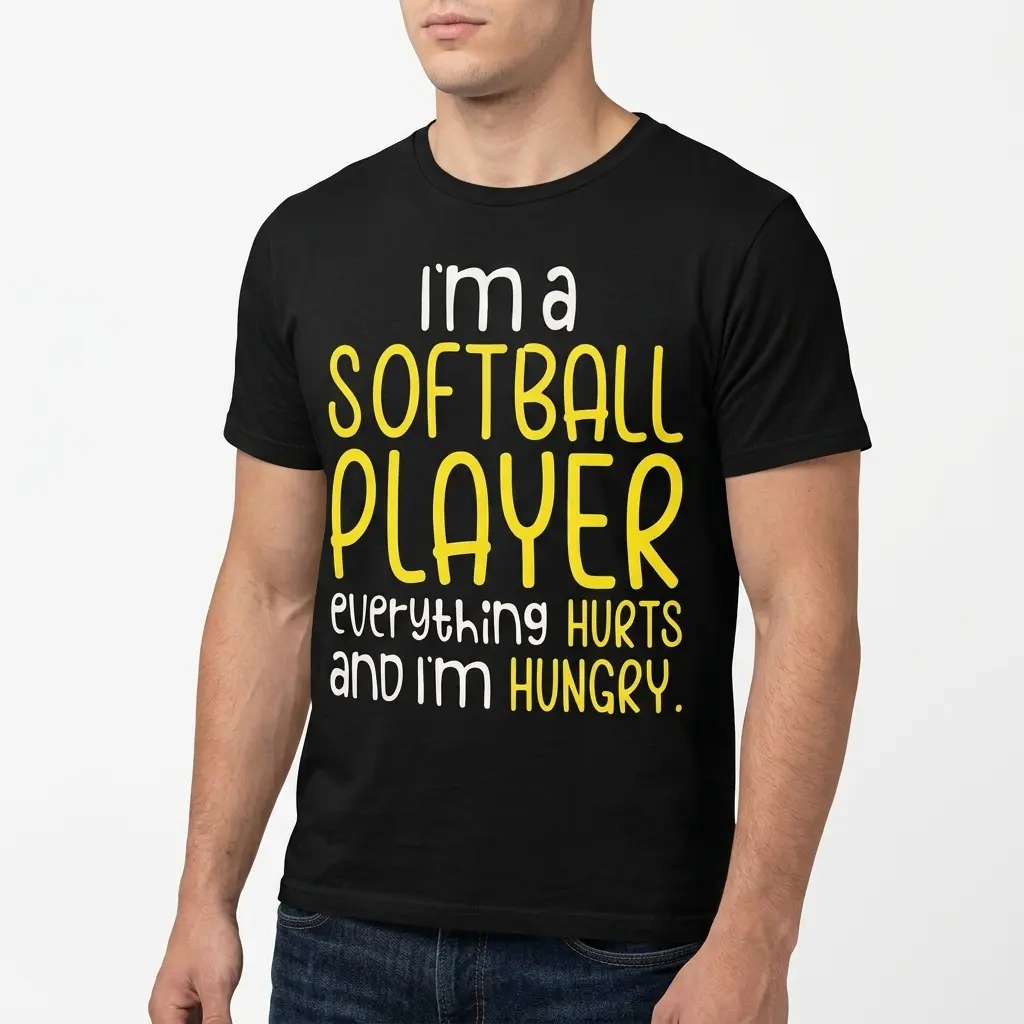 Graphic T-shirt with playful text for softball players, centered on black tee.