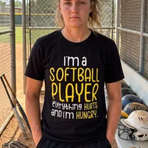 Funny Softball Player Everything Hurts T-Shirt 11 Person wearing the humorous softball player T-shirt in a casual setting.