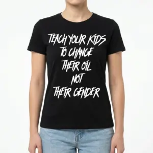 Funny Teach Kids To Change Oil T-Shirt 9 Close-up of the T-shirt fabric texture with visible stitching details.