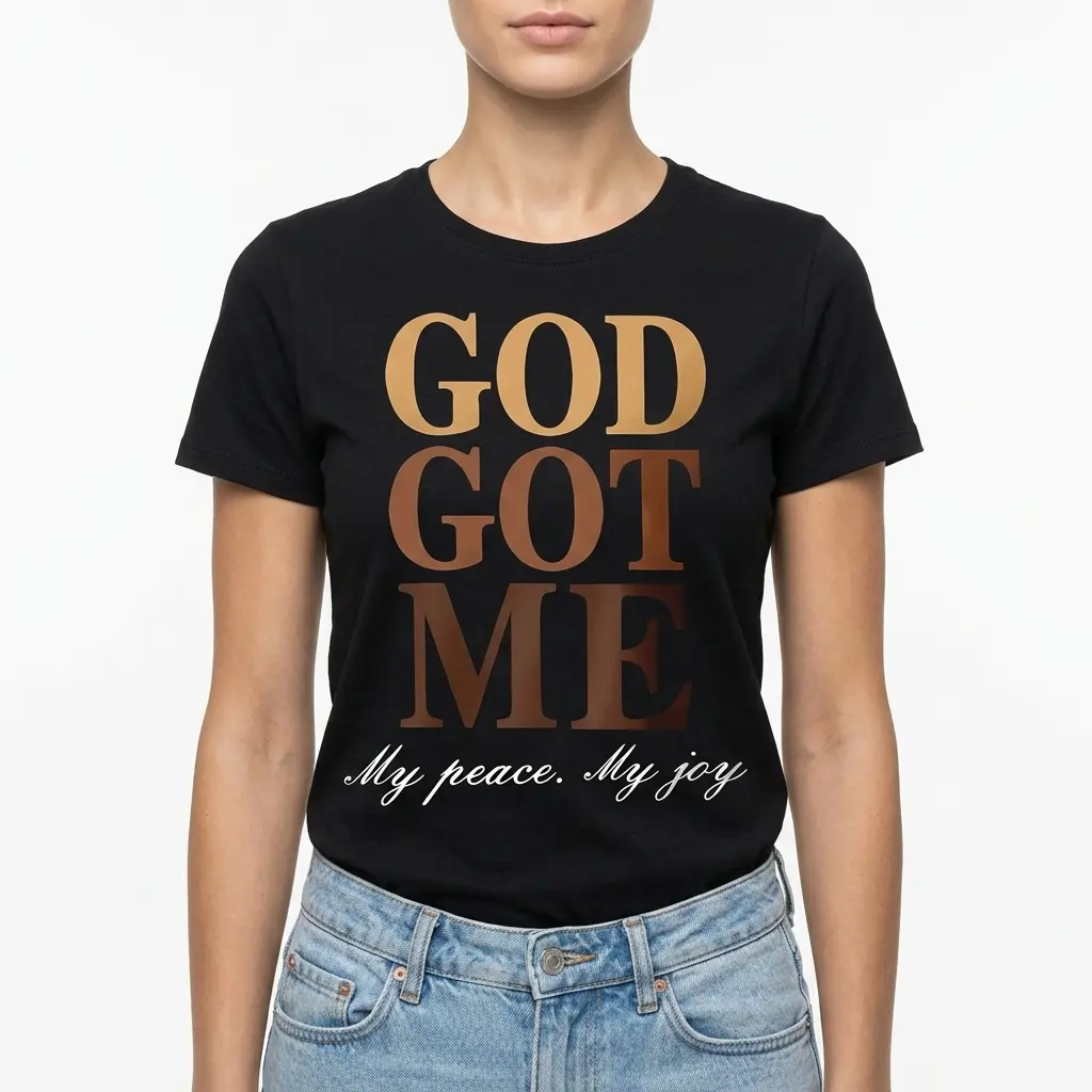 Faith-themed black T-shirt with 'God Got Me' print.