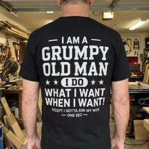 Grumpy Old Man Funny T-Shirt for Husbands 10 Man casually styled in a funny t-shirt, depicting humor about older married men.
