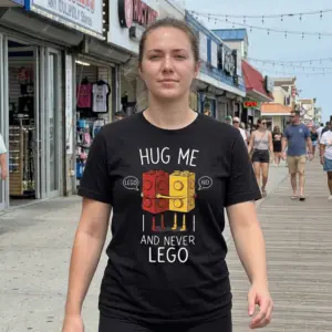 Hug Me and Never Lego Funny Couple T-Shirt 10 Lifestyle view of the 'Hug Me and Never Lego' funny couple shirt featuring hugging toy bricks.
