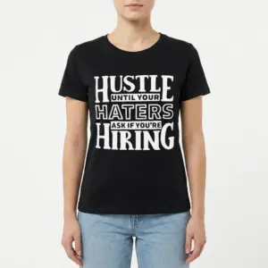 Hustle Until Your Haters Ask If You're Hiring T-Shirt 9 Graphic t-shirt featuring the phrase 'Hustle Until Your Haters Ask If You're Hiring' on black fabric.