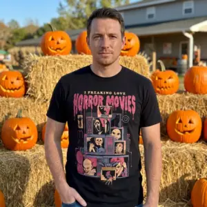 I Love Horror Movies T-Shirt 11 Individual showcasing a horror movie graphic tee outdoors.