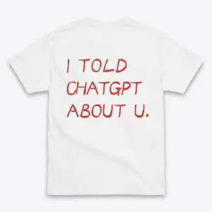 Back flat lay of a white t-shirt featuring the humorous text I Told ChatGPT About U in red handwritten lettering.