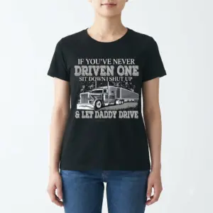 If You've Never Driven One Trucker T-Shirt 10 Female model wearing truck driver T-shirt, front view.