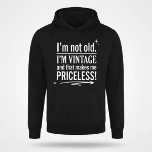 I'm Not Old I'm Vintage Priceless T-Shirt 7 Front flat lay of a black hoodie featuring the white typographic design I'm not old I'm VINTAGE and that makes me PRICELESS.
