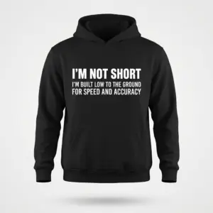 I'm Not Short Sarcastic Humor T-Shirt 7 Front flat lay view of a black hoodie featuring the sarcastic text design about being built low to the ground.