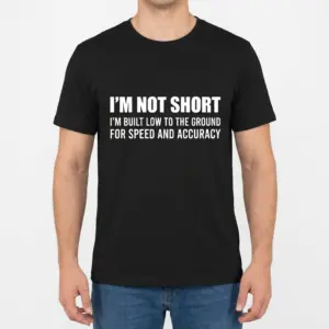 I'm Not Short Sarcastic Humor T-Shirt 9 Front view of a man wearing the black graphic t-shirt with the humorous quote about being short.