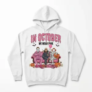 In October We Wear Pink Horror Villains Halloween Shirt 7 Halloween villain shirt featuring pink-themed characters.