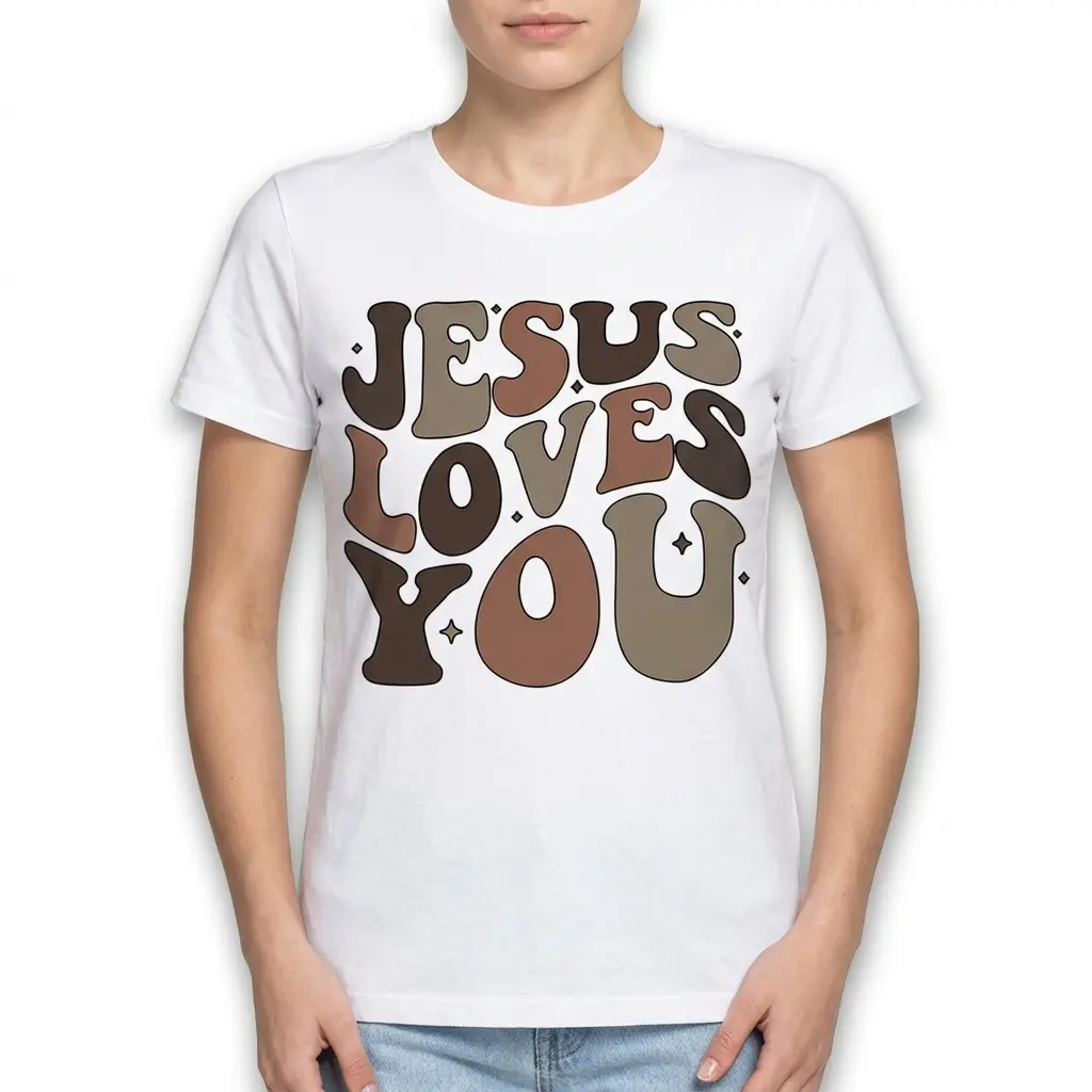 Flat lay of a t-shirt with the text 'Jesus Loves You' in a fun, retro style.